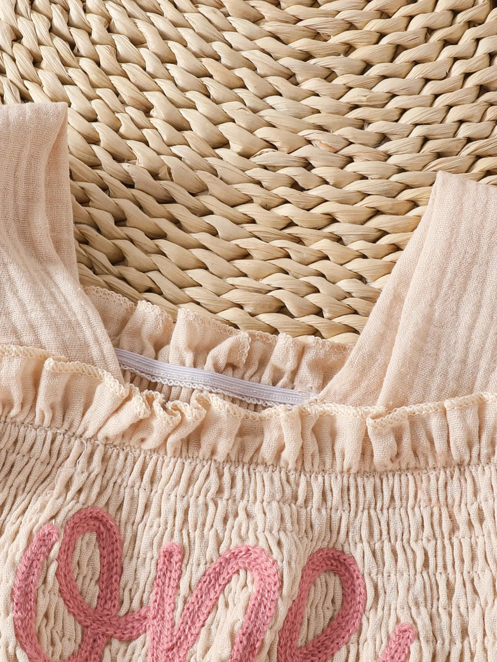 Mila Knitted Long-Sleeve Romper.
